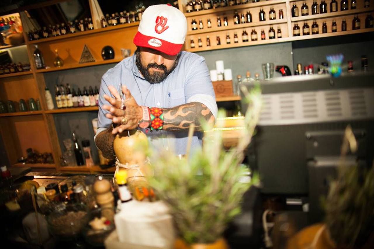 Bartender crafting a drink at Xaman in Mexico City